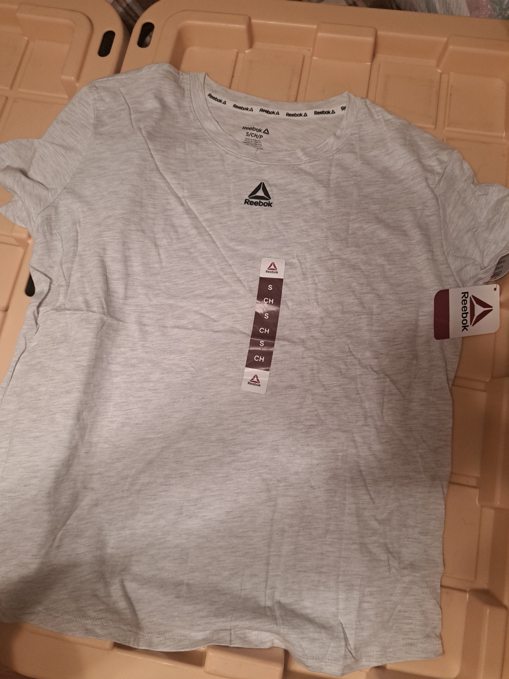 Reebok T-shirt.